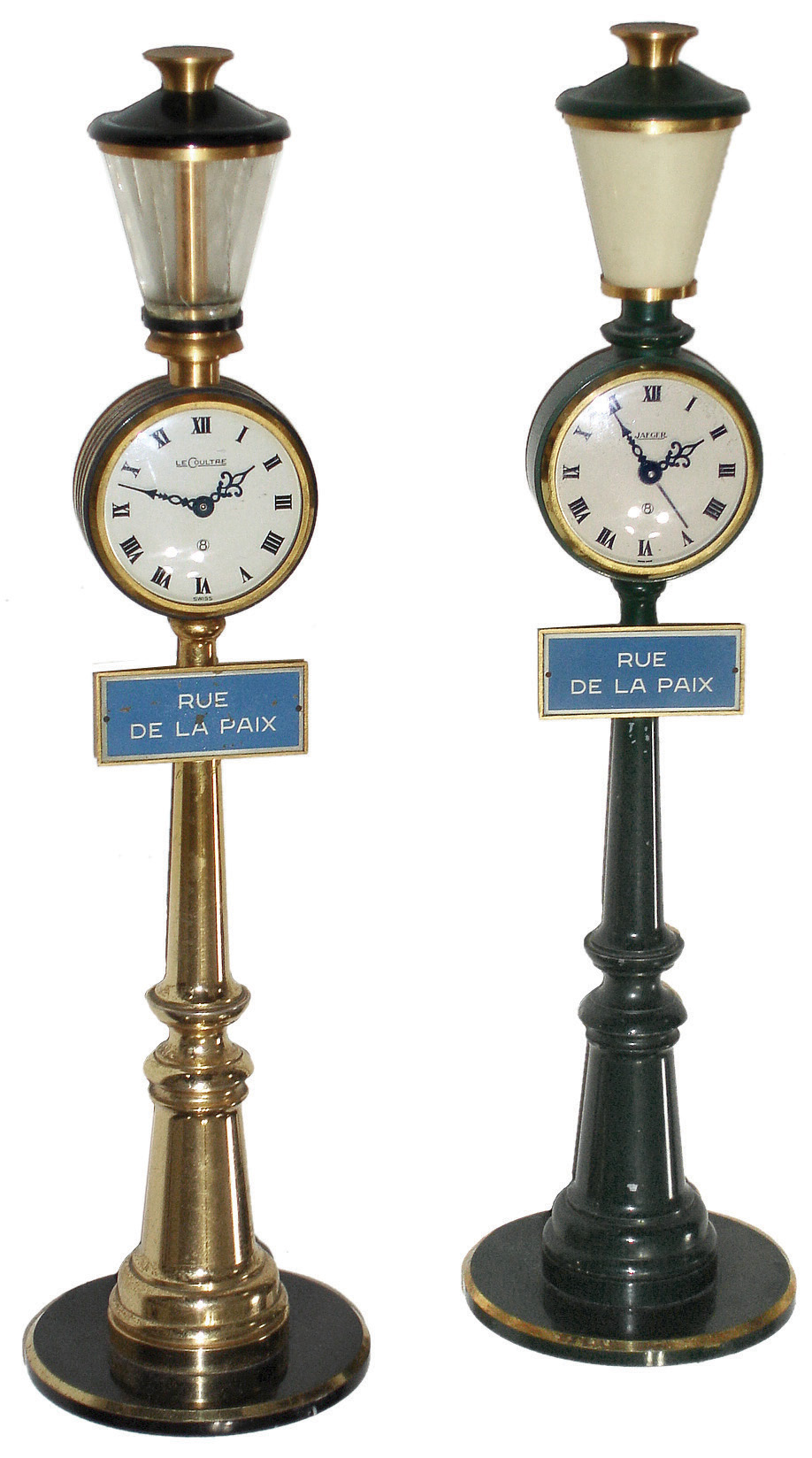 Clocks- 2 (Two) Swiss, Jaeger &amp; Le Coultre, ÒRUE DE LA PAIXÓ painted metal mini streetlamp timepieces, 8 days rear wind, set and regulation, lever movements. Jaeger has alarm. c1965 — Antique Clocks Price Guide