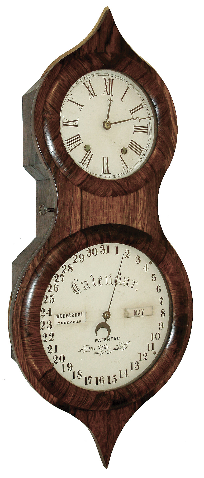 Seth Thomas Clock Co., Thomaston, Conn., ÒOffice Calendar No. 3 or PeanutÓ calendar wall clock, veneered rosewood case, inside of door with instruction label, white painted dials with black figures, blued steel hands, 8 days, timepiece movement with Mix Bros. patent calendar mechanism, c1865 — Antique Clocks Price Guide