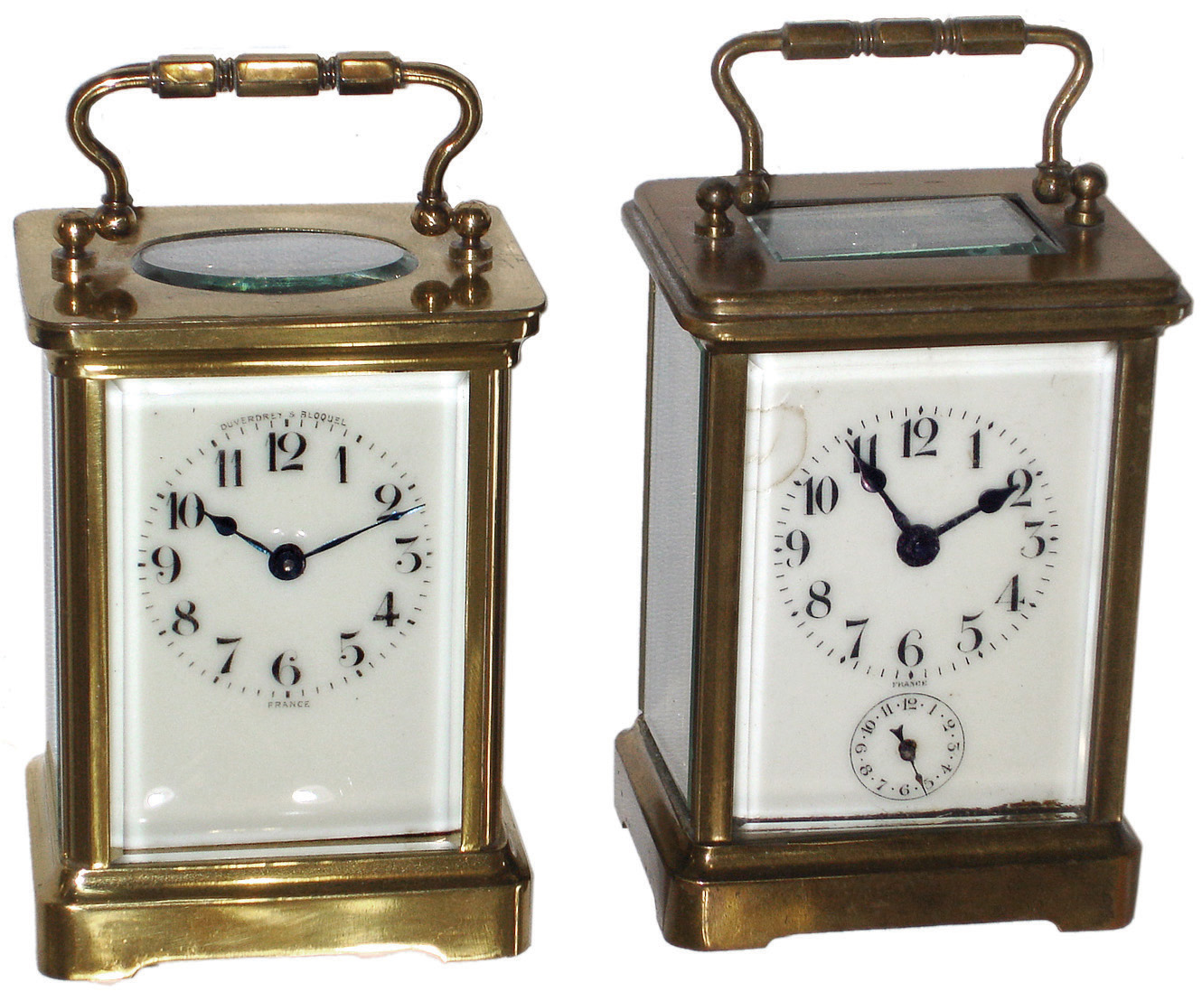 Clocks- 4 (Four) French carriage clocks, 8 days, brass and glass, early 20th century: (1), time only, by Duverdrey &amp; Bloquel with rampant lion trademark; (2) time and alarm with rampant lion trademark; (3) Quarter Repeating, 8 days, time and strike, c1900; (4) oval and alarm, c1900 — Antique Clocks Price Guide