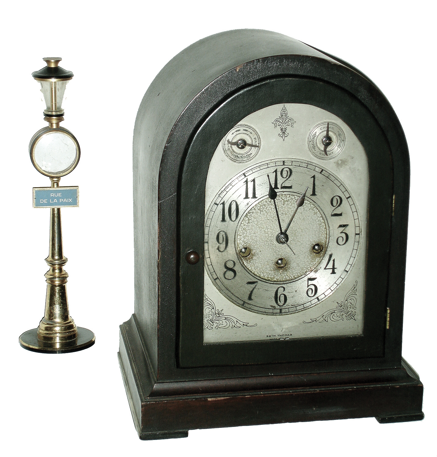 Clocks- 2 (Two), one incomplete: Seth Thomas Clock Co., Thomaston, Conn., ÓChime Clock No. 71Ò mahogany round top, 8 days, time and Westminster chime mantel clock, 113A movement, c1921, PLUS Swiss ÓRue de la PaixÒ streetlamp stand, no Jaeger LeCoultre movement. — Antique Clocks Price Guide