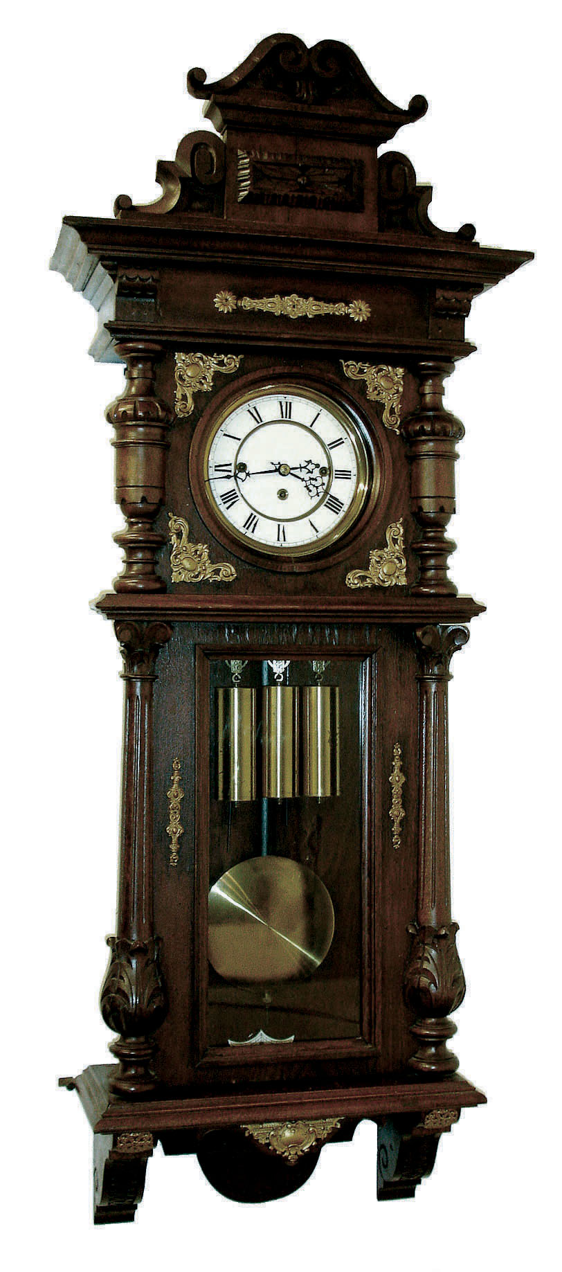 Germany, Vienna regulator, stained hardwood and walnut veneer case, architectural case with divided door, applied, carved split columns, removable carved crest, and applied stamped brass ornament, Roman numeral white enamel dial , pierced steel hands, brass 3 train, weight driven, 8 days, time and strike, movement with grand sonnerie striking, brass pendulum with ebonized wooden rod, and 3 brass weights, c1910 — Antique Clocks Price Guide