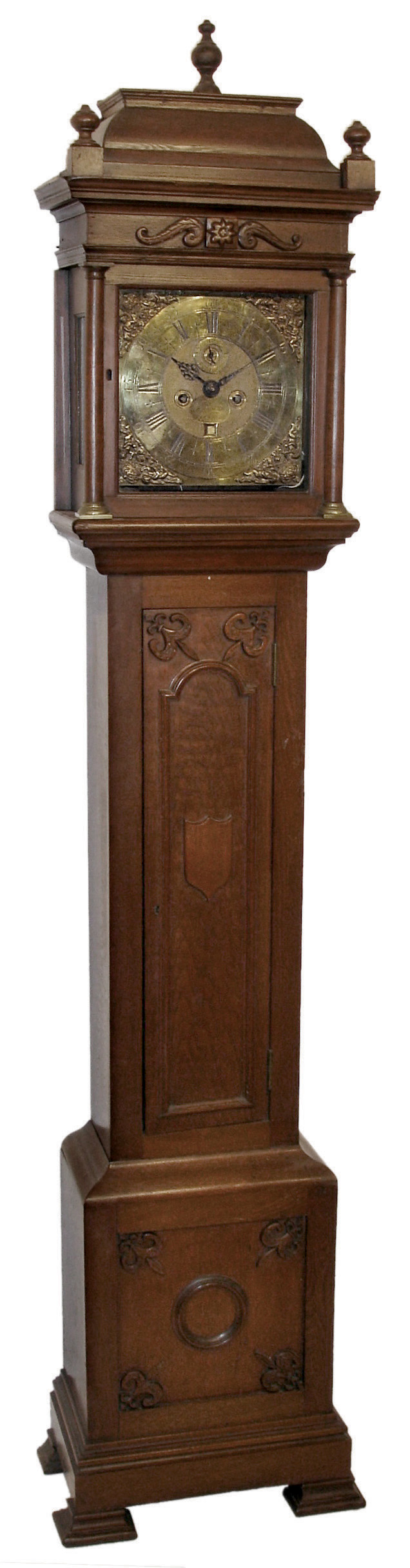 W. Tomlinson, London, England, tall case clock, 8 days, time, strike and calendar, weight driven movement in a pagoda top walnut case with applied fleur-de-lis and other ornaments and a brass dial with cast brass spandrels, c1780 — Antique Clocks Price Guide