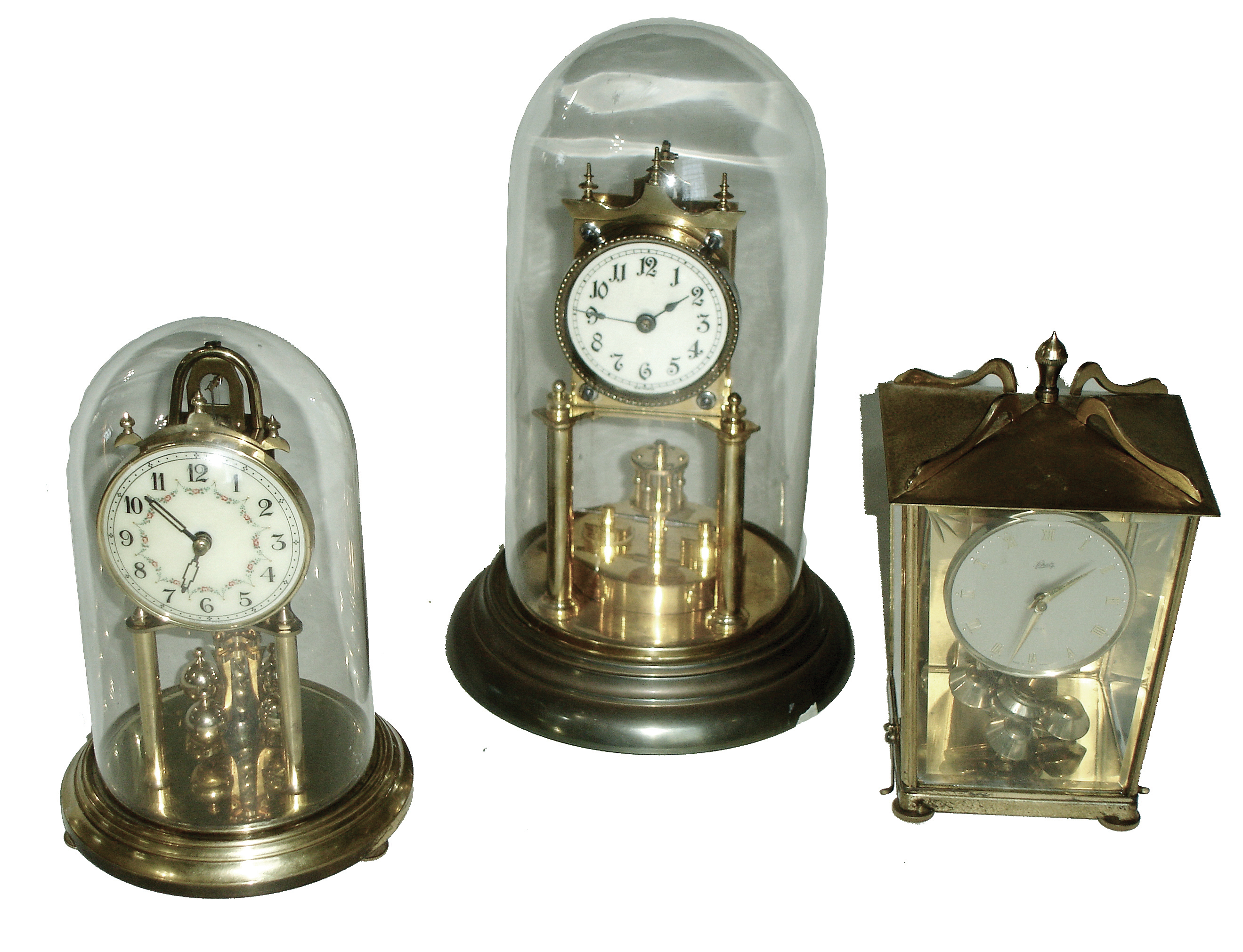 Clocks- 9 (Nine) Tambour and 400-Day: 6 (Six) tambours including 3 plug-in electrics; 3 (Three) German anniversary clocks including one earlier with disk pendulum; 20th century — Antique Clocks Price Guide