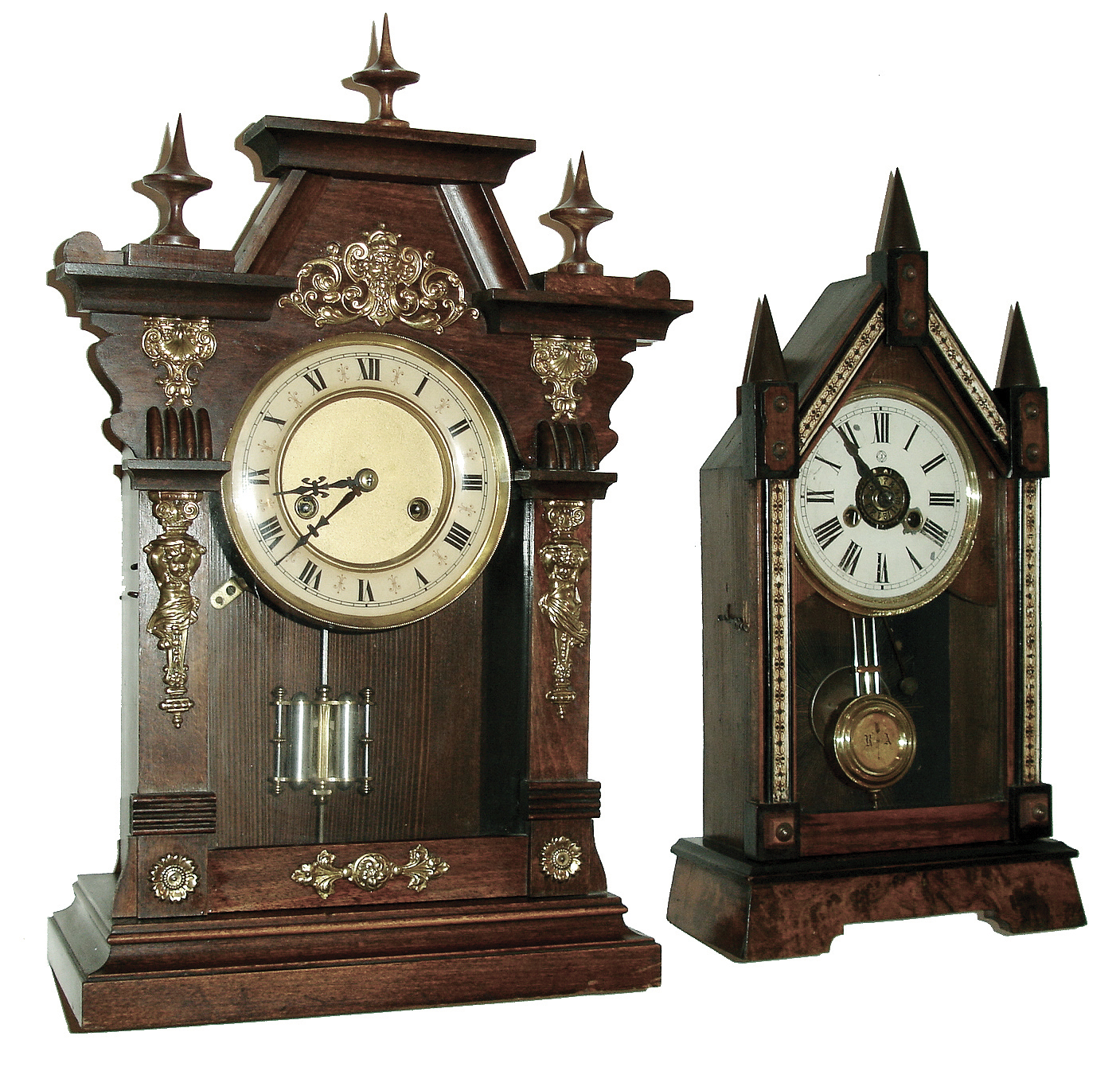Clocks- 2 (Two): (1) Junghans Clock Co., Steeple clock with a, 30 hours, time &amp; alarm movement in a wood case with burl decorations, c1900. (2) German shelf clock with spring driven, 8 days, time &amp; strike movement in wood case with brass embellishments, c1920. — Antique Clocks Price Guide