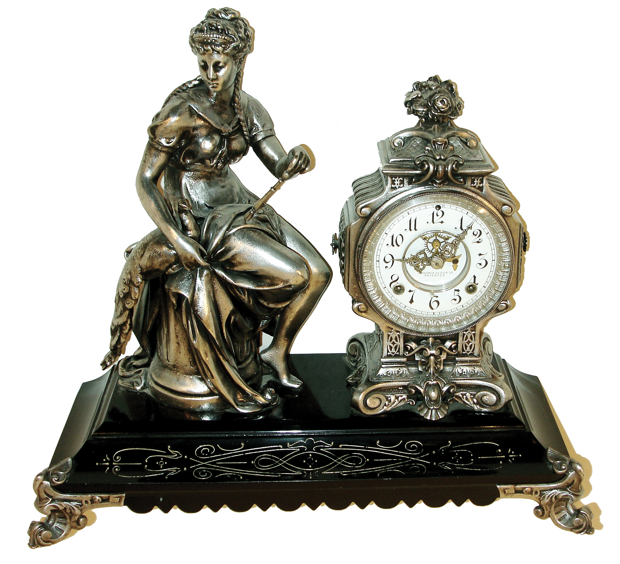 Ansonia Clock Co., New York, NY, ÓCirceÒ figural shelf clock, 8 days, time and strike, spring driven movement in a Silver finished spelter case on an enameled cast iron base with a white enamel dial and open escapement, c1890 — Antique Clocks Price Guide