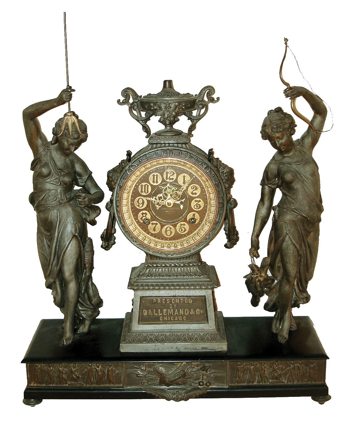 Ansonia Clock Co., New York, NY, ÒFisher and HunterÓ double statue figural shelf clock, 8 days, time and strike, spring driven movement with decorated back plate. SIlver finished spelter case on an enameled cast iron base with applied cast Silver finished friezes with a brass dial, open escapement and embossed numerals, c1894 includes plaque cast into base ÒPRESENTED BY DALLEMAND &amp; CO. CHICAGOÓ — Antique Clocks Price Guide