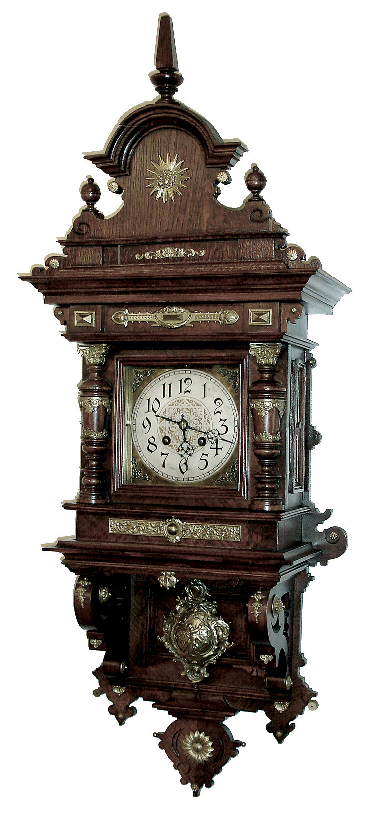 Lenzkirch, Germany, mahogany ÓFreischwingerÒ, time and quarter strike. This model similar to the model 73 in the 1892 catalog, but this one with a different top bearing a sunburst. Serial No. 1,198,629 circa 1899. — Antique Clocks Price Guide