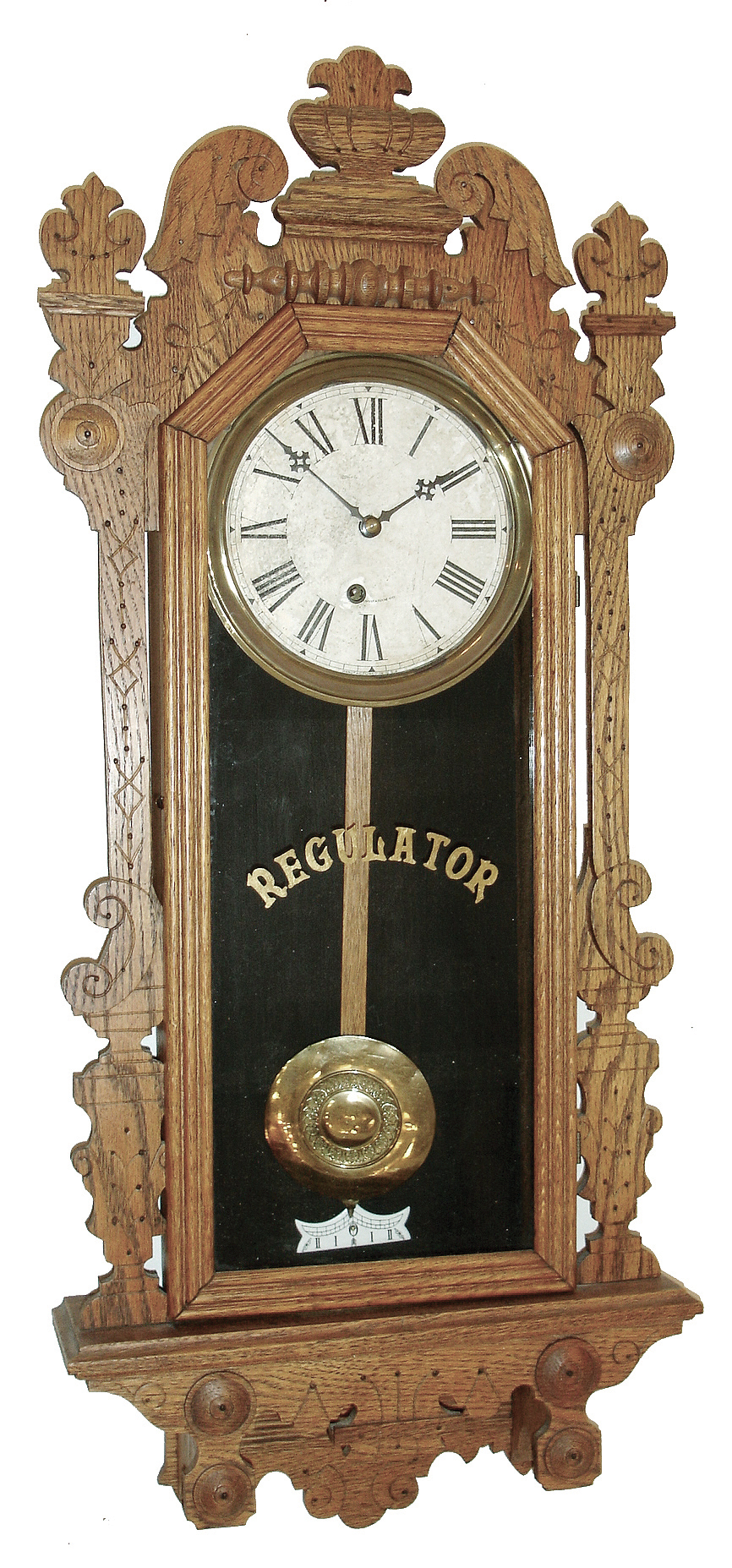 E. Ingraham &amp; Co., Bristol, Conn., ÒArcticÓ oak, 8 days, time only, hanging gingerbread wall clock, 1896 — Antique Clocks Price Guide