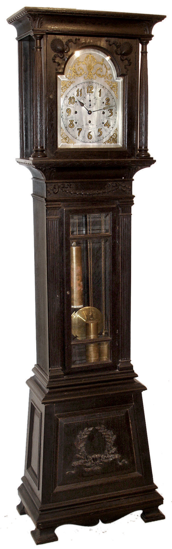 Seth Thomas Clock Co., Thomaston, Conn., ÓHall Clock No. 25Ò, tall case clock, 8 days, time, strike and Westminster chimes on bells, three brass, weight driven movement in an ebonized oak case with beveled glasses. Silvered brass dial with gold leafed numerals and spandrels, c1900 — Antique Clocks Price Guide
