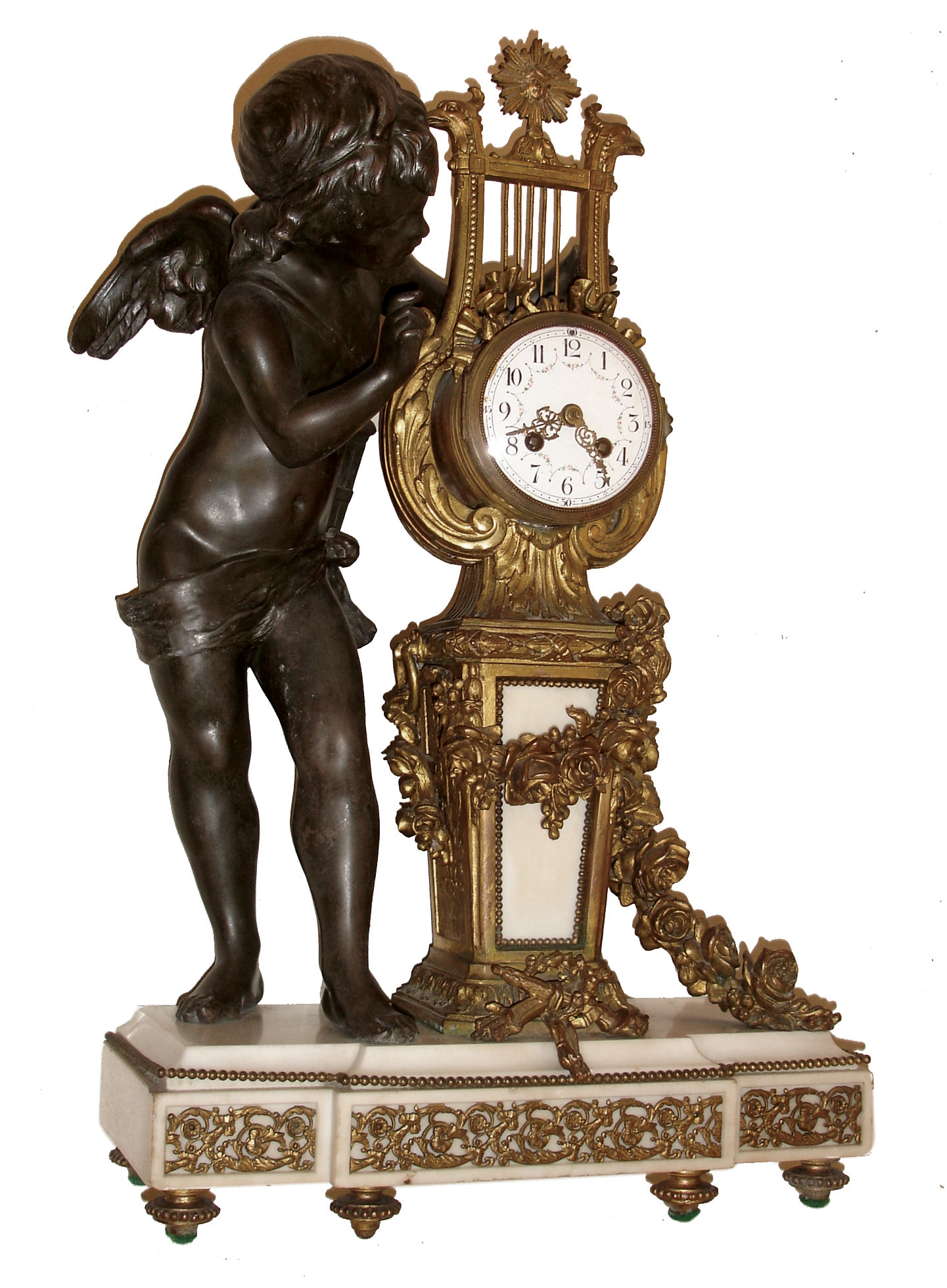 France, figural mantel clock, brass lyre case with bronze figure of putto inspecting clock on white marble base decorated with gilt trim, the lyre case with acanthus, floral garlands, and a large festoon of fruits and flowers, white enamel Arabic numeral dial with polychrome enamel decoration, gilt Louis XV style hands, 8 days, time and count wheel strike pendule a Paris movement, signed ÓAD. MouginÒ, c1870 — Antique Clocks Price Guide