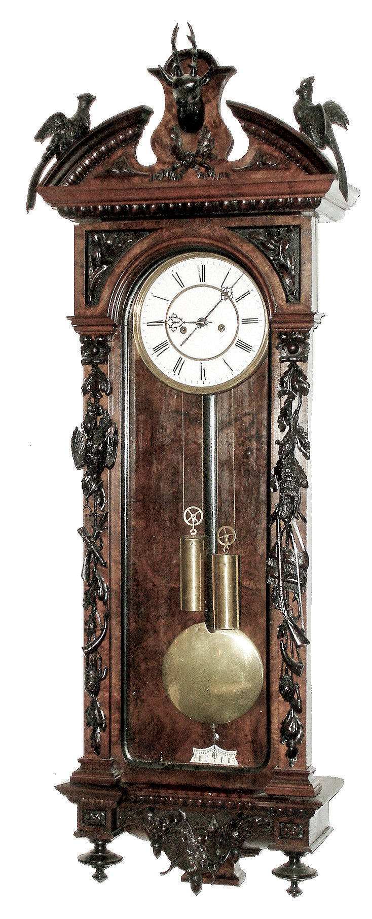 Lenzkirch, Germany, Vienna Regulator wall clock, 8 days, 2-wt, time and strike, weight driven movement marked with Lenzkirch hallmark in a mahogany and ebonized case with ornately detailed carvings in hunting motif including oak leaves, acorns, rabbits, quail, etc. and a white enamel dial, serial number 213734, c1871 — Antique Clocks Price Guide