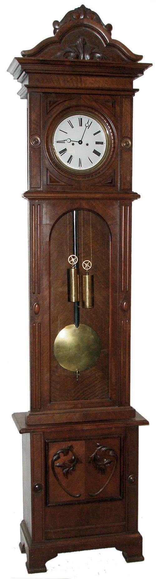 Lenzkirch, Germany, tall case clock, 8 days, time and bell strike, two brass, weight driven movement in a walnut case with an ornately carved top, applied carvings to base, cartouches on either side of door and white enamel dial, serial number 474673, c1879 — Antique Clocks Price Guide