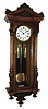 Clocks- 2 (Two) German 8 days, two weight Vienna Regulator style wall clocks in walnut cases, late 19th century.