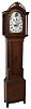 Unsigned New England tall clock, 8 days, time, strike and calendar, weight driven movement in a birch case with inlaid medallion on trunk door, fret work crest, reeded columns flanking hood door, reeded corner columns flanking trunk door and a painted iron dial, c1820