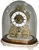 Skeleton clock, England, brass, 8 days, time only, mantel clock with chain-driven fusee, white marble base, oval glass dome (cracked), c1880