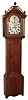 Unsigned New Hampshire tall clock, 8 days, time and strike, weight driven movement with typical New Hampshire cutouts in a maple and tiger maple case with full columns and fret work crest on hood with a painted metal dial, dated 1818 inside trunk door