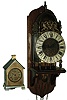 Clocks- 5 (Five) and a barometer: (1) Reproduction German, 8 days, time and strike, weight-driven lantern clock with Hermle 241-070 movement made in 1984 and wooden wall bracket; (2) Seth Thomas ÓLodgeÒ model house-shape thirty-hour, time and strike, novelty clock, c1900; (3) Winterhalder & Hoffmeir, Germany, for J.E. Caldwell & Co., inlaid mahogany, 8 days, dual chime 3 train small bracket clock with 9 jewel balance platform, c1900 (4) Barr Mfg. Corp., Weedsport, NY, electric battery mantel clock, c1920 (5) Russian modern submarine timepiece in heavy metal case, c1920 (6) German walnut hanging barometer, 20th century