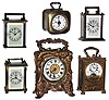 Clocks- 6 (Six) small portable carriage clock timepieces: first and rarest is the Swiss, 8 days, ÓEnduraÒ Hebdomas-style with visible balance; New Haven ÓNugget; Waterbury ÒMidge and ÓSpotÒ; fancy cast case Ansonia ÓVidaÒ; and German small cube with alarm; early 20th century