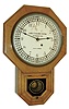 Seth Thomas Clock Co., Thomaston, Conn., ÒDrop Octagon 12 InchÓ wall hanging clock with an, 8 days, timepiece movement and Santa Fe RR dial in an oak case, c1902.