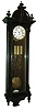 Clocks- 2 (Two), 8 days, walnut weight-driven Vienna Regulator wall clocks: dark-stained unsigned three-weight quarter-striking; Remember ebonized one-weight time only, c1890