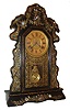 Ansonia Clock Co., New York, NY, ÒKitchenÓ shelf clock with a spring driven, 8 days, time and half hour strike movement in a highly decorated mother of pearl wooden case, c1914.