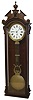 F. Kroeber & Co., New York, N.Y., ÓSwiss Regulator No. 22Ò, wall clock, 8 days, time only, brass, weight driven, Swiss made movement with pinwheel escapement and center sweep seconds in a mahogany case with burled highlights on crest and Jenny Lind casting with a white enamel dial, c1880