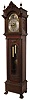 Tobey Furniture Co., Chicago, Illinois, tall case clock, 8 days, time, strike and chime on 5 tubes stamped Elite, three brass, weight driven, German Winterhalder & Hofmeier movement in a mahogany case with full reeded Corinthian columns flanking trunk and hood, applied carvings on hood crest and trunk door, resting on paw feet with a, brass dial with silvered chapter ring, subsidiary seconds, moon phase and cast brass and etched corner spandrels and dial center, c1905