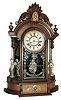 Ansonia Clock Co., New York, NY, ÓTriumphÒ shelf clock in a walnut case with a spring driven, 8 days, time an half hour strike movement, c1880.