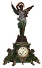 Ansonia Clock Co., New York, NY, ÒUndine (base) and Gloria (statue)Ó mantel clock with an, 8 days, time and strike, movement in a cast metal case, c1904.