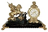 Ansonia Clock Co., New York, NY, ÒBoar HunterÓ figural shelf clock, 8 days, time and strike, spring driven movement in a cast metal case on a fancy enameled cast iron base with bold attached paw feet, a cream enamel dial and open escapement, c1894