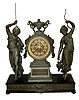 Ansonia Clock Co., New York, NY, ÒFisher and HunterÓ double statue figural shelf clock, 8 days, time and strike, spring driven movement with decorated back plate. SIlver finished spelter case on an enameled cast iron base with applied cast Silver finished friezes with a brass dial, open escapement and embossed numerals, c1894 includes plaque cast into base ÒPRESENTED BY DALLEMAND & CO. CHICAGOÓ