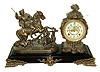 Ansonia Clock Co., New York, NY, ÒBoar HunterÓ figural shelf clock, 8 days, time and strike, spring driven movement in a cast spelter figures on an enameled cast iron base with attached feet, a cream enamel dial and open escapement, c1894