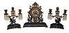 Ansonia Clock Co., New York, NY, three piece mantle clock set consisiting of the ÓRenaissanceÒ shelf clock with 8 days, spring driven, time and half hour strike movement and two ÓNo. 1062Ò matching candelabra, c1886.