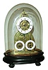 France, miniature skeleton timepiece, with calendar and alarm, on an ebonized base and with old glass dome, c1851