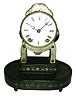 Terry Clock Co., Waterbury, Conn., small skeleton double spring timepiece, with embossed decorations to plates and to the trim over the dial, less dome, c1870