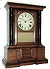 Clocks- 2 (Two) American: (1) Atkins Clock Co., Bristol, Conn., ÓLondonÒ shelf clock in a rosewood case with a spring driven, 8 days, time and strike, movement, c1863 (2) Seth Thomas Clock Co., Plymouth Hollow, Conn., 8 days, ÓColumnÒ clock in a rosewood veneer case with a spring driven, 8 days, time and strike, movement c1860.