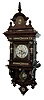 Lenzkirch, Germany, mahogany ÓFreischwingerÒ, time and quarter strike. This model similar to the model 73 in the 1892 catalog, but this one with a different top bearing a sunburst. Serial No. 1,198,629 circa 1899.