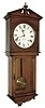 Seth Thomas Clock Co., Thomaston, Conn., ÒUmbriaÓ wall hanging clock in an Òold oakÓ case with a spring driven, 8 days, time and strike, movement, c1894.