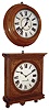Clocks- 2 (Two): Conn. wall hanging clocks: (1) Seth Thomas Clock Co., Thomaston, Conn., ÒOffice No. 5Ó wall clock in old oak case with spring driven, 8 days, time only, movement, c1909. (2) Waterbury Clock Co., Waterbury, Conn., ÒGalleryÓ wall clock in oak with a spring driven, 8 days, time only, movement, c1893.