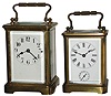 Clocks- 3 (Three) French carriage clocks, 8 days, brass and beveled glass, white porcelain dials, old lever escapement platforms; larger is time and strike; smaller is time and alarm; c1910, together with a Waltham Art Deco style double side desk clock and a Morbier movement
