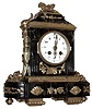 France, for Tiffany & Co., New York, small mantel clock, the Portoro marble case decorated with classically inspired gilt ornament, gilt bezel with deep convex glass, Arabic numeral white enamel dial, gilt hands with piercing and engraving, 8 days, time and strike, pendule a Paris movement marked ÒVincentiÓ, c1910