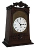 Chinese bracket clock, mahogany case with carved ornament, engraved brass dial surround, Roman numeral white enamel dial, 2 train, time and strike, movement
