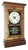 Waterbury Clock Co., Waterbury, Conn., ÒParlorÓ clock in a rosewood veneer case with a weight driven, 30 hours, time and strike, movement, c1870.