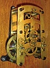 Seth Thomas Clock Co., Thomaston, Conn., ÒUmbriaÓ wall hanging clock with spring driven, 15 day, time only, movement in an oak case, c1890.