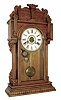 Waterbury Clock Co., Waterbury, Conn., ÒNiagaraÓ shelf clock with a spring driven, 8 days, time, half hour strike and alarm movement in an oak case, c1912.