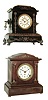 Clocks- 2 (Two): (1) Ansonia Clock Co., Ansonia, Conn., 8 days, time and strike, spring brass movement iron case black mantel clock, c185. This example is the same as the ÒSt. ClairÓ model with different side ornaments. (2) Seth Thomas Clock Co., Thomaston Conn., ÒBerkleyÓ, 8 days, time and strike, spring brass movement mantel clock, c1908.
