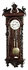 Lenzkirch, Germany, Vienna Regulator wall clock, 8 days, 2-wt, time and strike, weight driven movement marked with Lenzkirch hallmark in a mahogany and ebonized case with ornately detailed carvings in hunting motif including oak leaves, acorns, rabbits, quail, etc. and a white enamel dial, serial number 213734, c1871