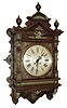 Lenzkirch, Germany, gallery clock, architectural oak case with applied cast ornament, top with turned finials, also with applied brass decoration Roman numeral silvered dial, black painted steel hands, 8 days, time and strike, movement, serial No. 871393, c1890