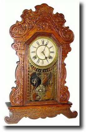 C.1910, Waterbury, FESTUS, pressed oak gingerbread in generally good — Antique Clocks Price Guide