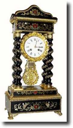 C.1870, French, Empire 4-Column clock, profusely inlaid and — Antique Clocks Price Guide